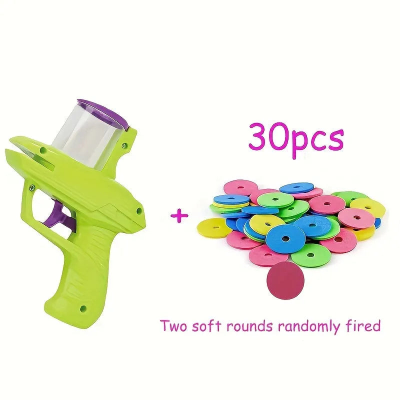 Green interactive battery-free cat toy launcher with foam disc on a floor.