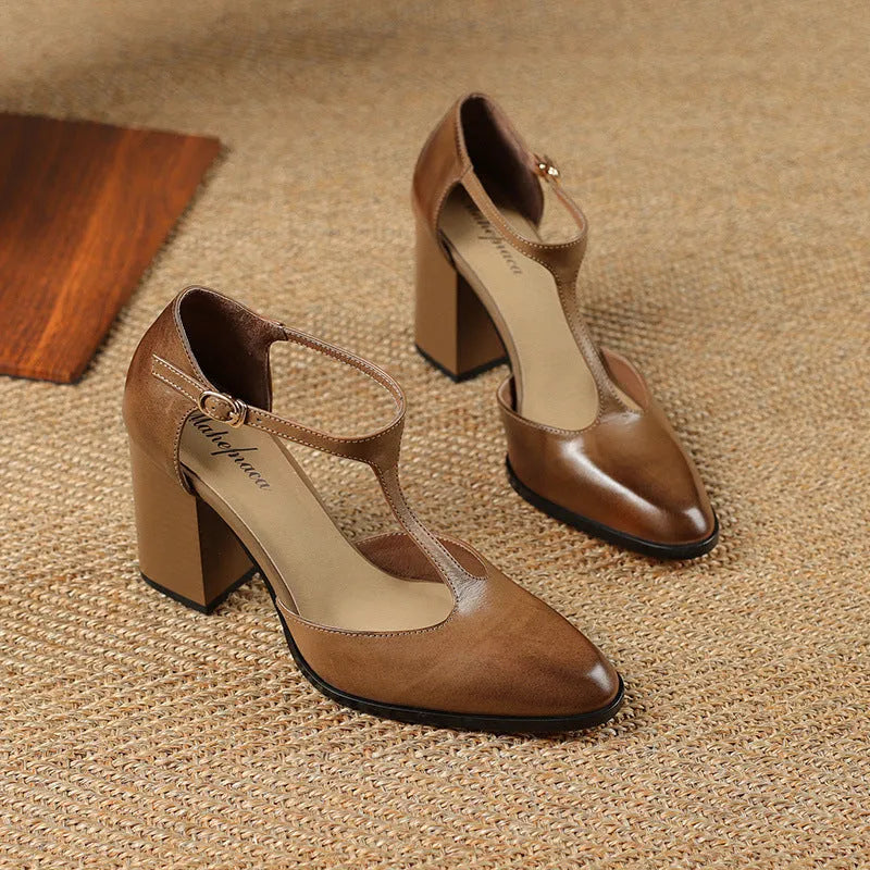 Women's retro pointed toe Mary Jane shoes with buckle fastening in dark brown leather.