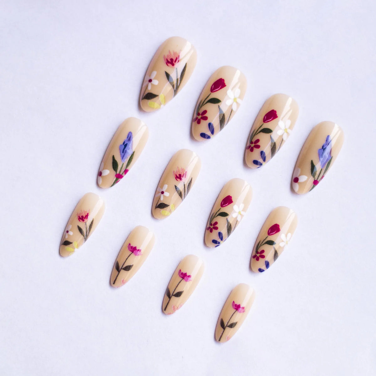 Removable flower armour nail art set with almond shapes and floral patterns