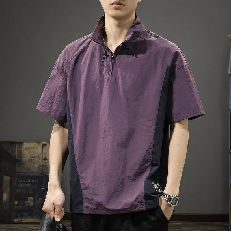 Men's brown half-zip short sleeve casual shirt with a stand collar, shown in a loose fit.