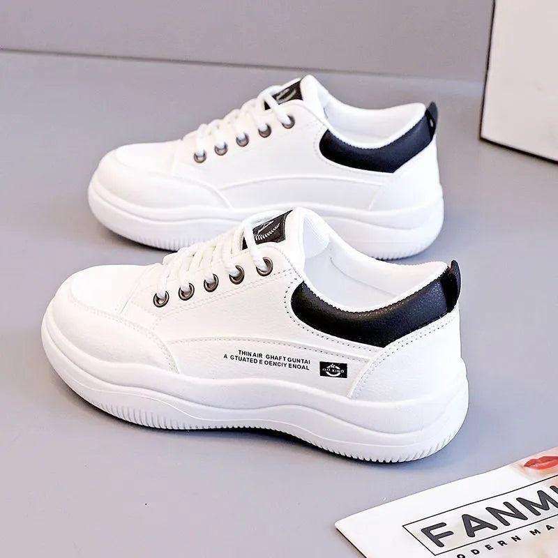 Women's white Korean-style lace-up pumps with cross straps and a round toe.