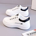 Women's white Korean-style lace-up pumps with cross straps and a round toe.