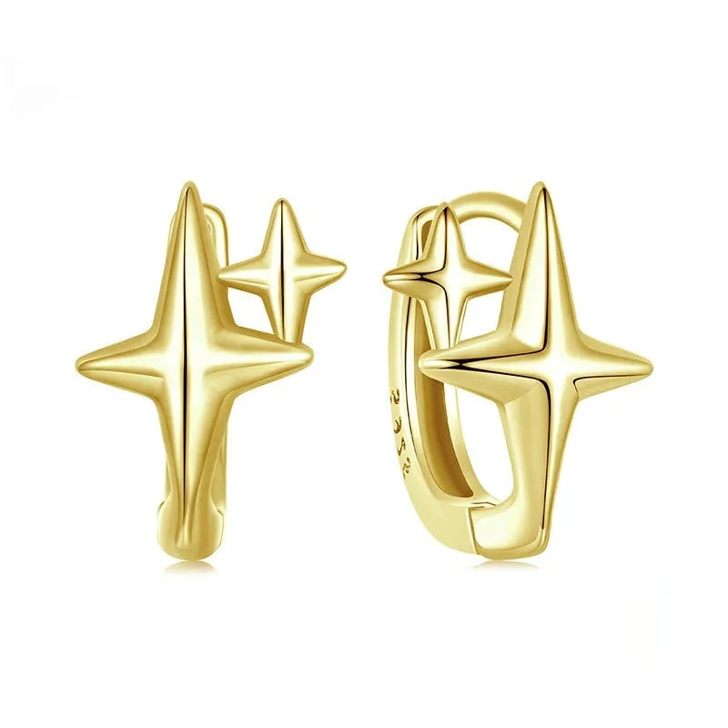 Sterling silver star ear clips with oxidised finish and clip-on mechanism