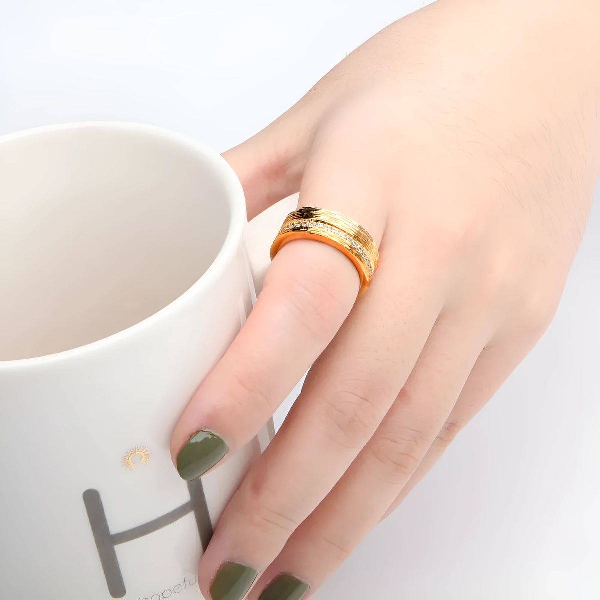 Gold geometric women's zircon ring with copper construction in sizes 6, 7 and 8