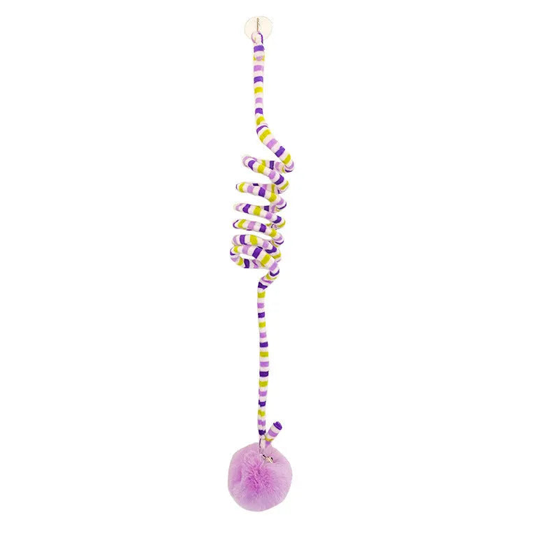 Hanging cat toy with colourful spring bell stick and inflatable ball attached to clear suction cup