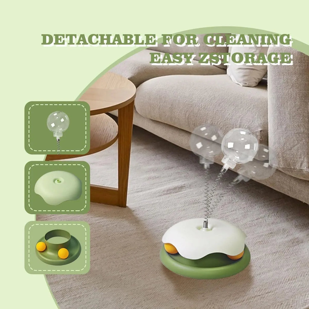 Blue and green PP plastic cat treat dispenser toy with a track ball on a textured base