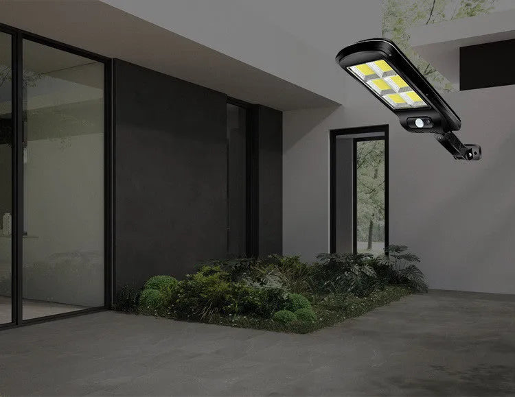 Black solar powered motion sensor street light for outdoor security with PIR sensor