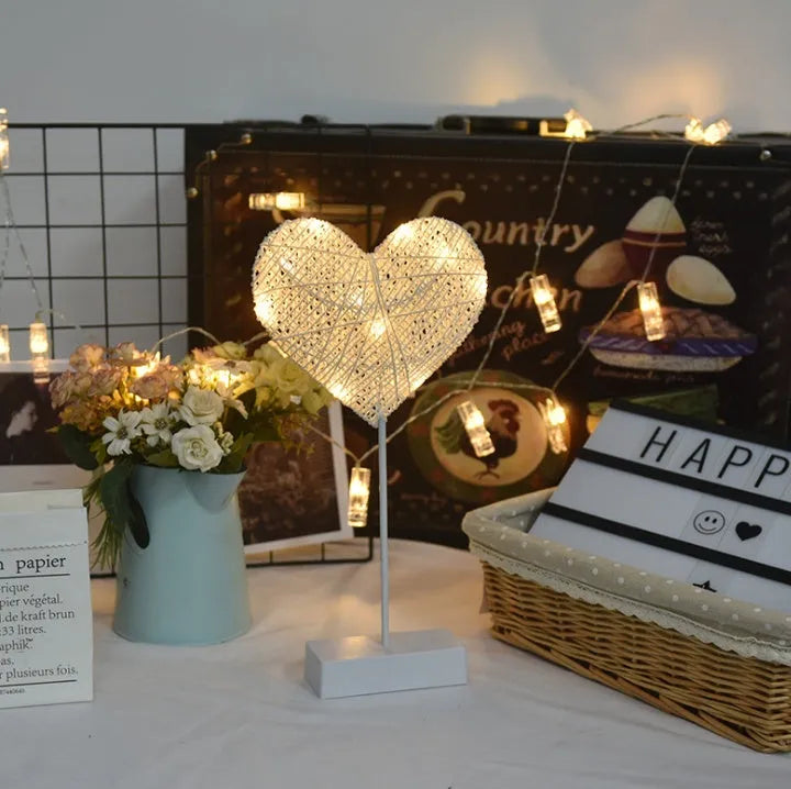Rattan LED string lights with heart, star, and moon shapes for bedroom decoration