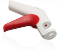 Stainless steel cherry kernel remover kitchen tool with red plunger and ergonomic handle.