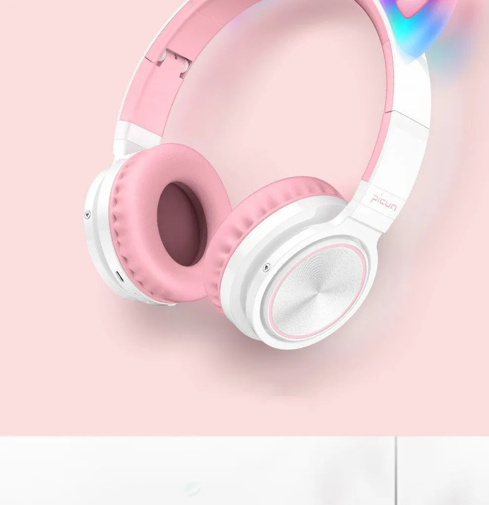 Pink and white wireless Bluetooth headset with head-mounted design and 40mm speakers