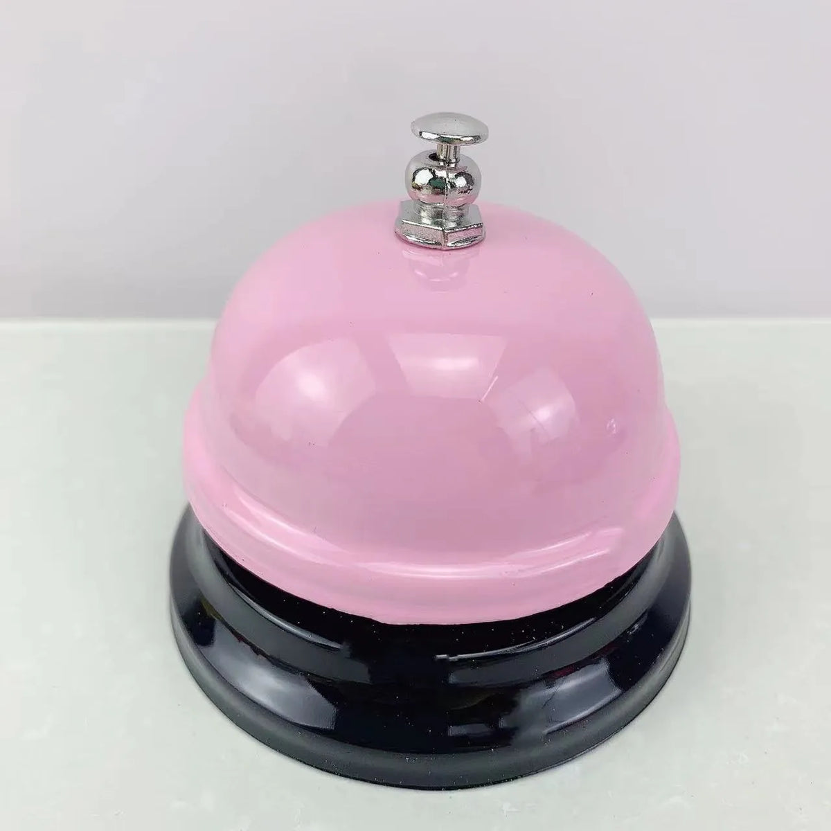Iron game bell for classroom or restaurant use in various colours including green tea and rose kiss