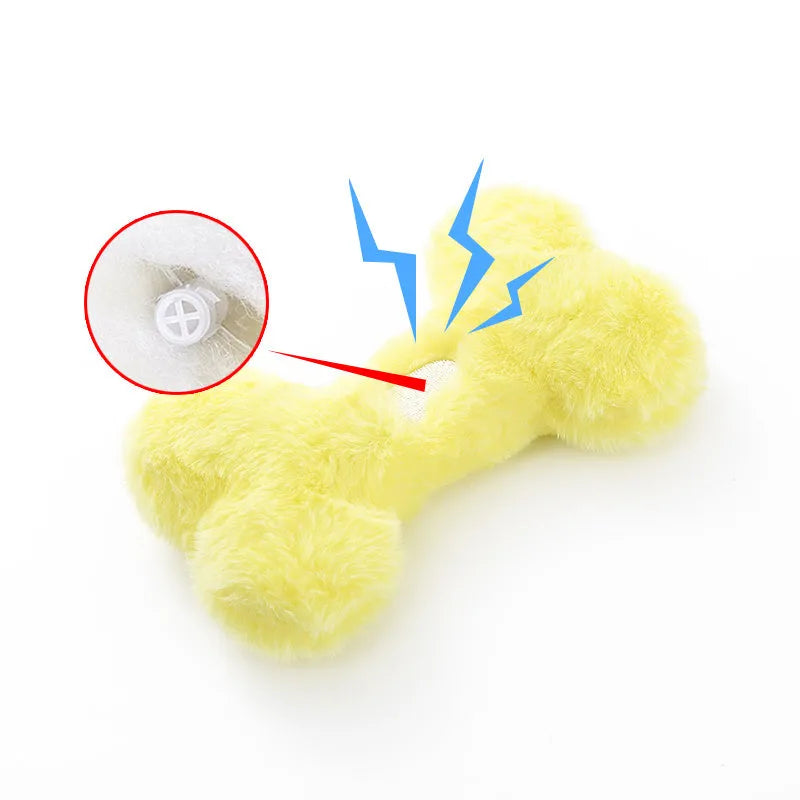 Plush love bone dog toy with squeaker in blue pink yellow colours