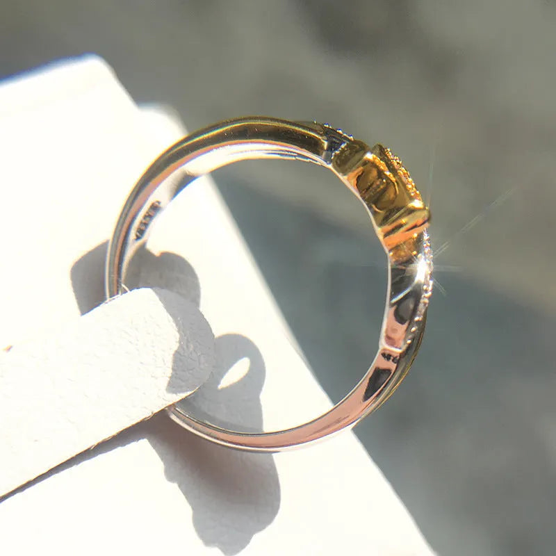 18k yellow gold plated ribbon ring with pink diamond inlay, US sizes 5 to 11, individual packaging