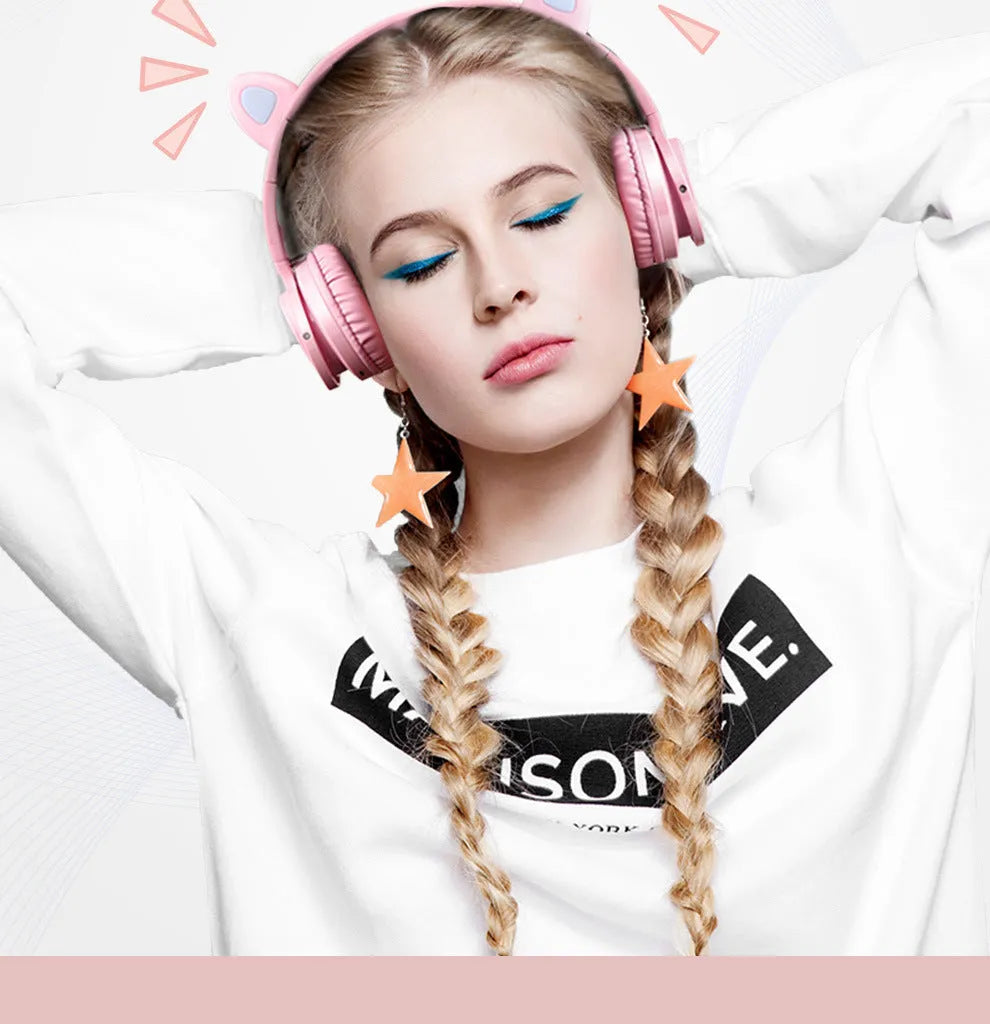 Pink and white wireless Bluetooth headset with head-mounted design and 40mm speakers