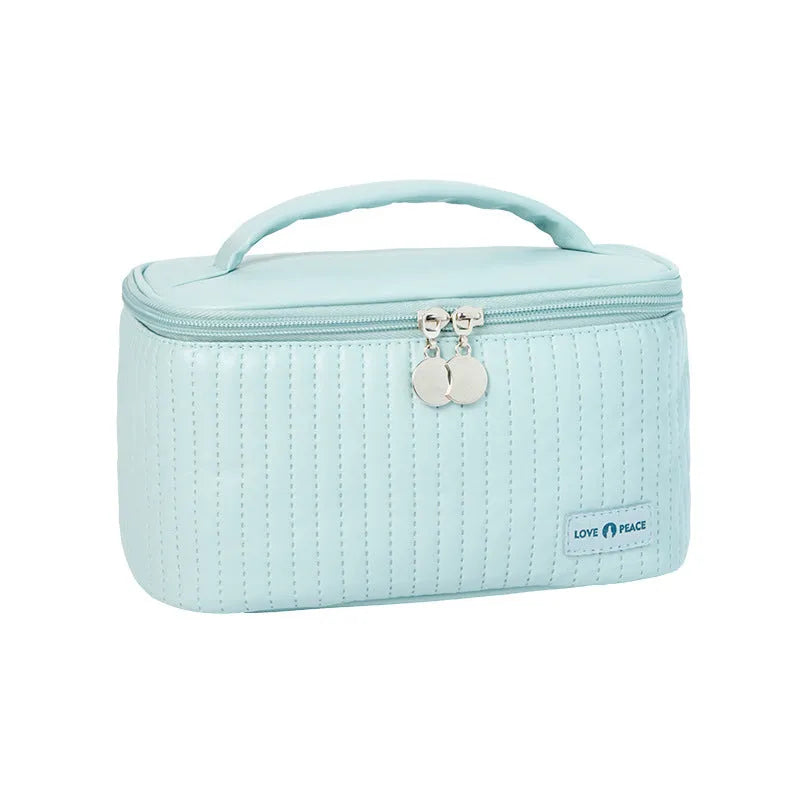 Open-top pink PU leather cosmetic bag with solid colour design