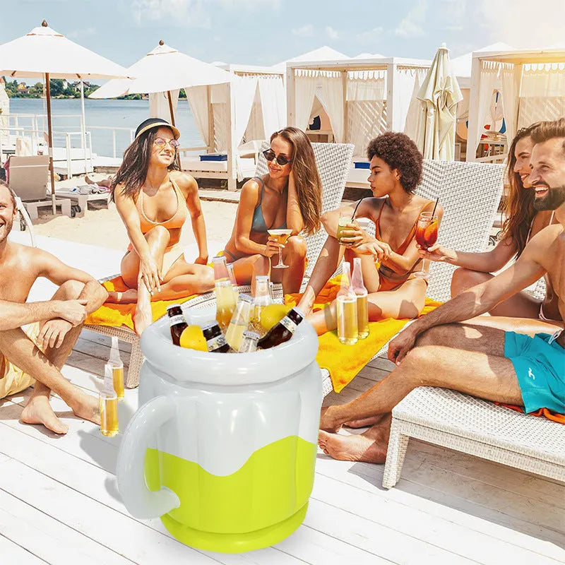 Yellow inflatable PVC ice bucket for beer steins and drink cans at an outdoor setting.
