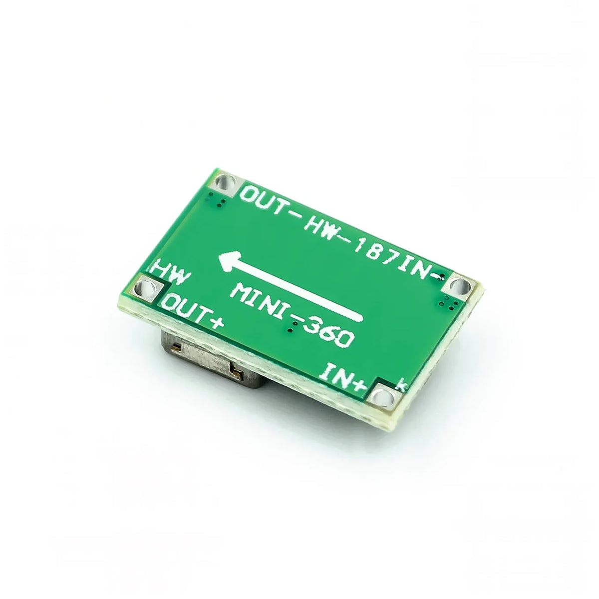 Mini 360 green DC-DC buck converter step down power supply module on white background