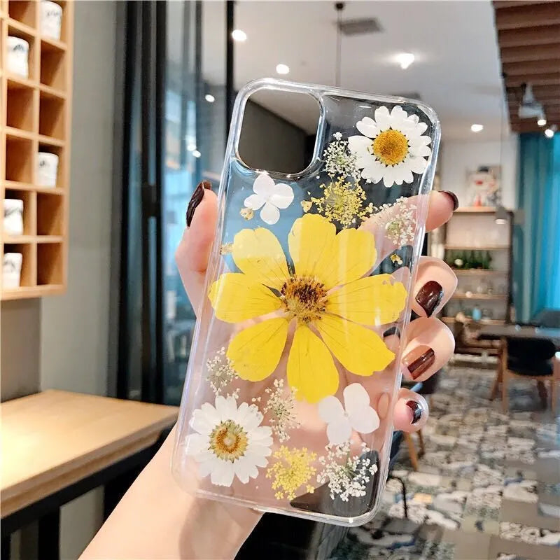Floral pattern TPU mobile phone case for iPhone in pink and yellow colour options.