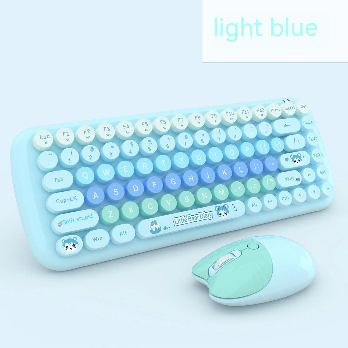 Compact pink wireless keyboard and mouse set with USB receiver on a desk