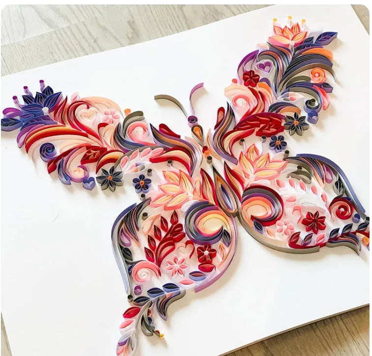 20 inch handmade quilled paper butterfly wall decoration in blue or pink with craft tools