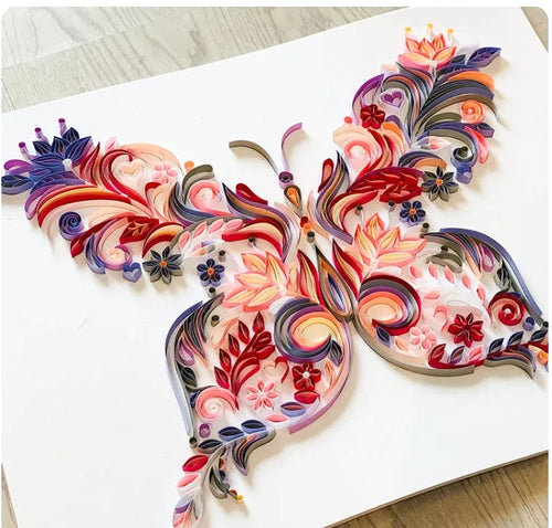 20 inch handmade quilled paper butterfly wall decoration in blue or pink with craft tools