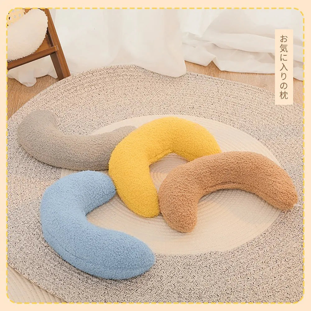 U-shaped blue cat pillow with adjustable cervical collar on white background