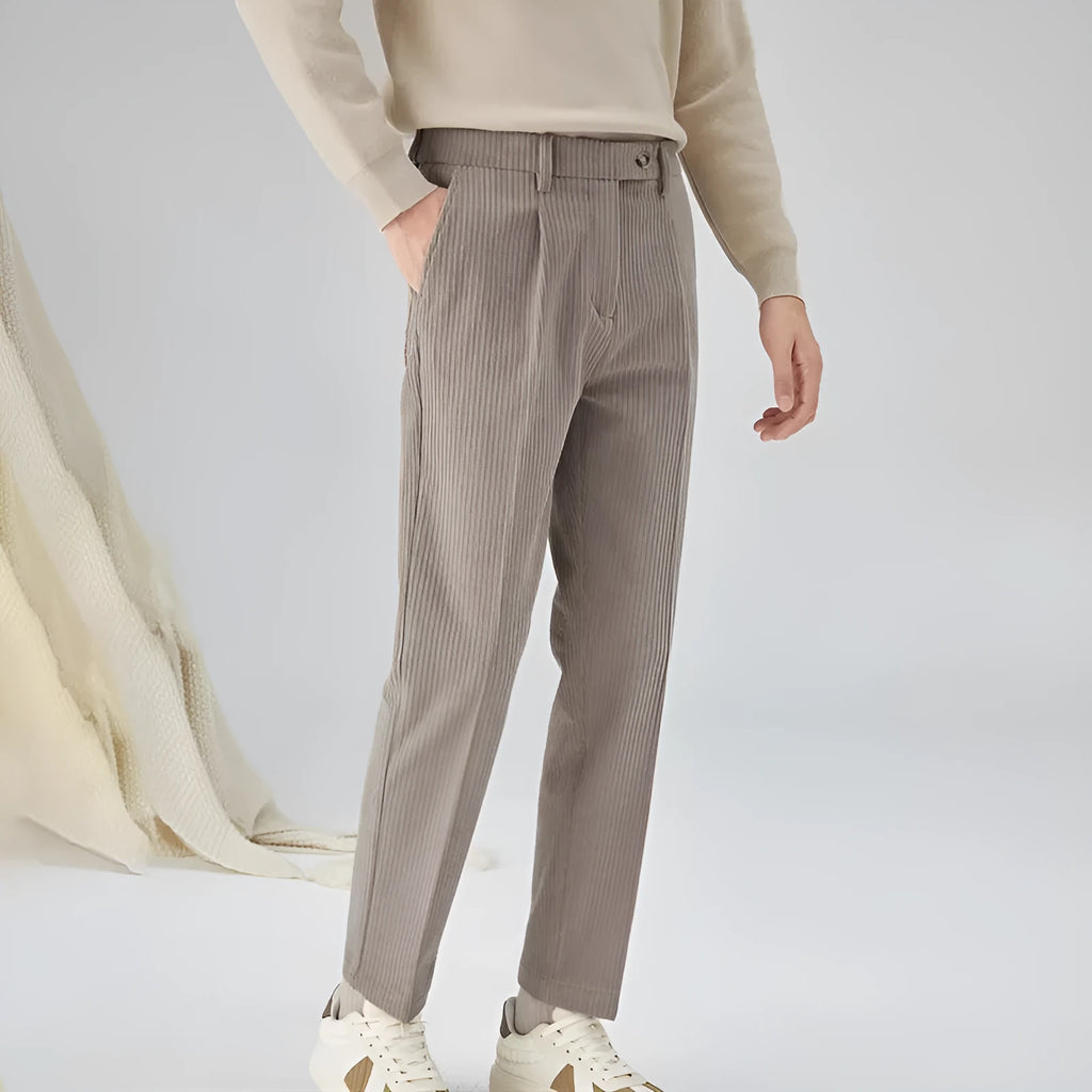 Men's straight-leg corduroy trousers in beige, black, and brown grey, showing mid-waist and micro elastic fabric detail.