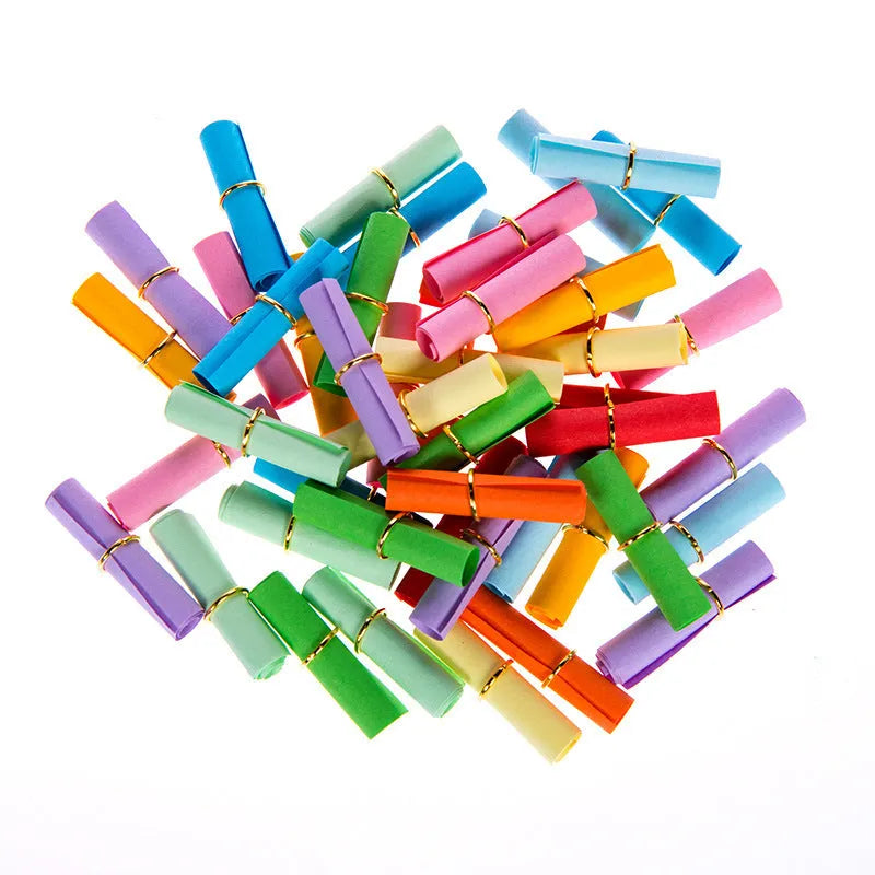 Colourful drift bottle message paper scrolls in various sizes with metal eyelets for hanging.
