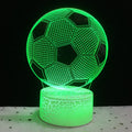 3D football-shaped acrylic night light displaying blue LED colour on a black ABS base.