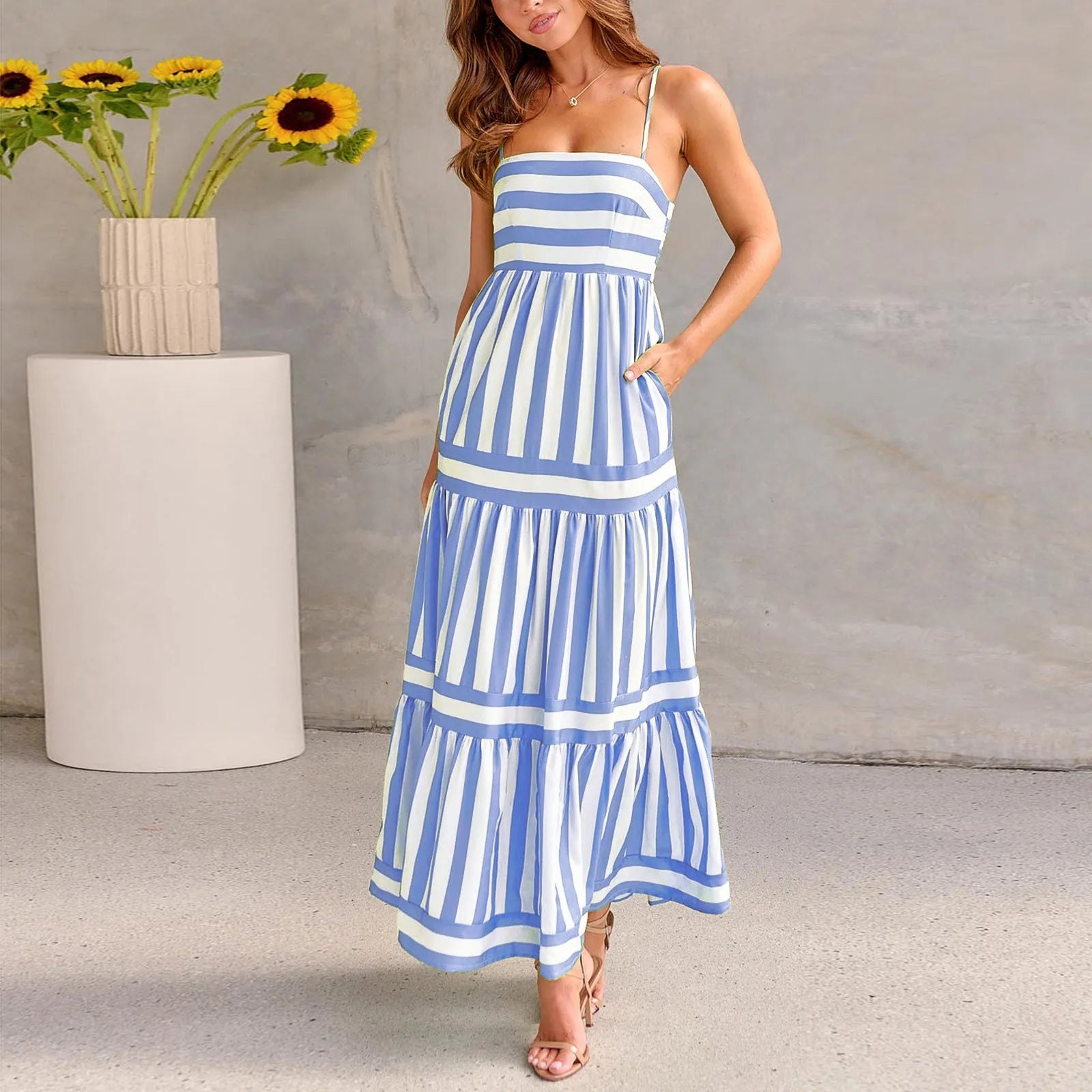 Long striped backless square neck summer dress with side pockets shown in multiple colour options.