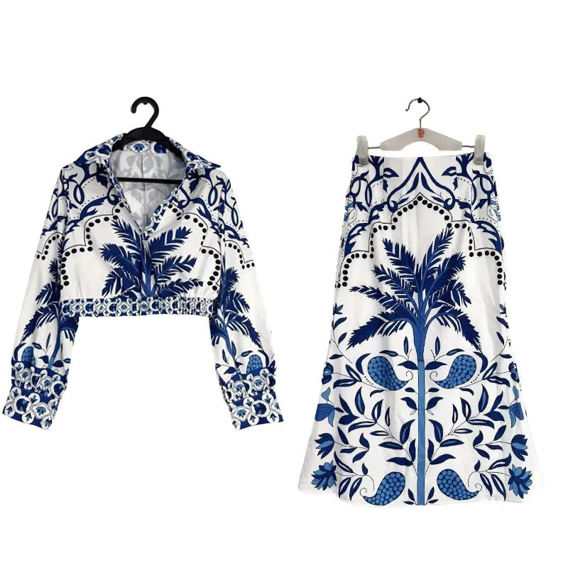 Women's long sleeve top and long skirt two-piece co-ord set in a solid colour.