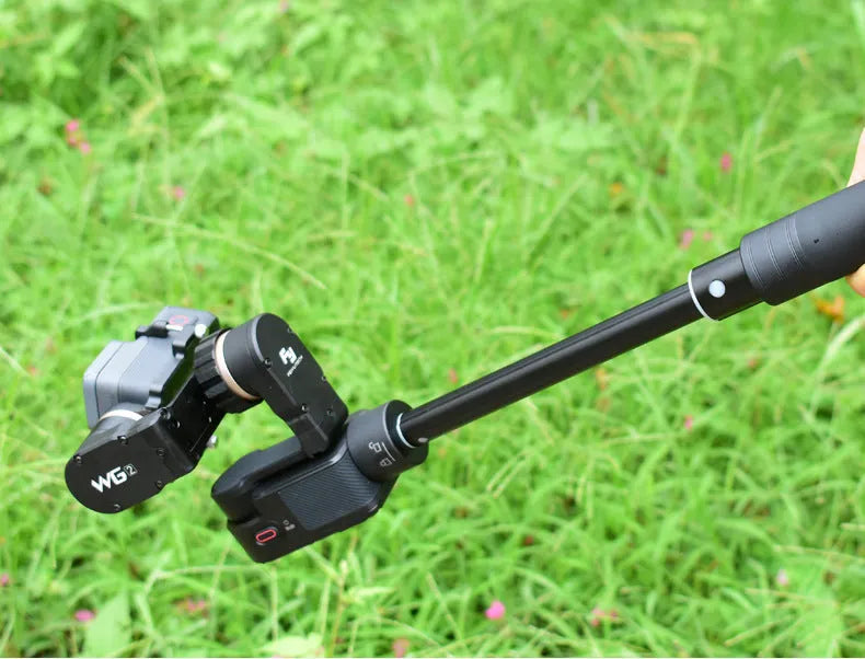 Black retractable selfie stick handheld stabiliser extended for smartphone photography