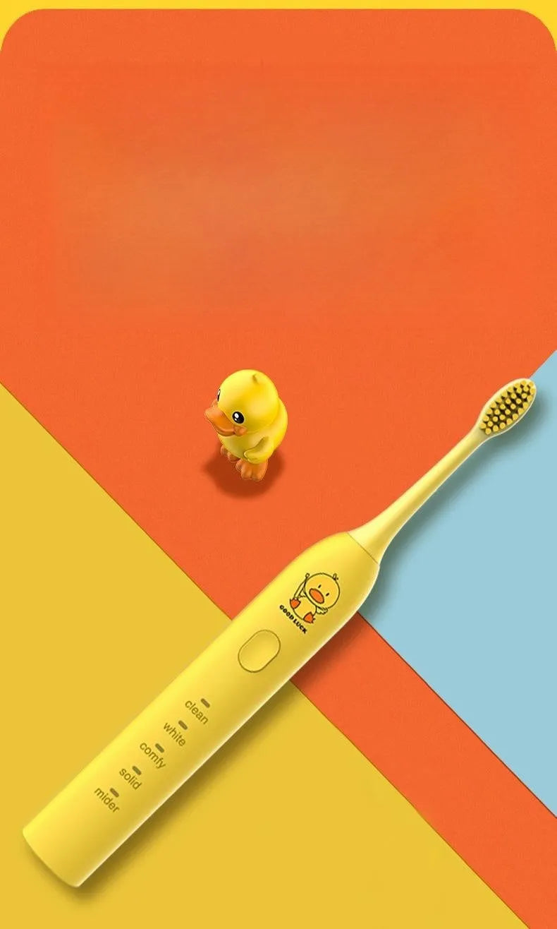 Small yellow duck design USB rechargeable electric toothbrush with soft bristles.
