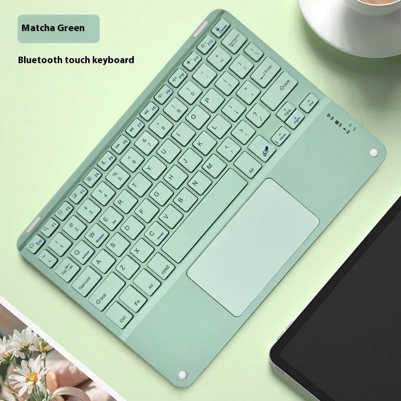 Square Hat Touch Bluetooth wireless keyboard shown in one of eight colour options on a desk.