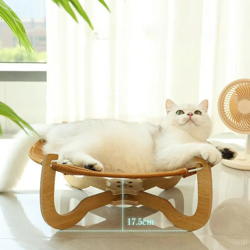 Brown woven rattan hammock pet bed measuring 46cm square with elevated design