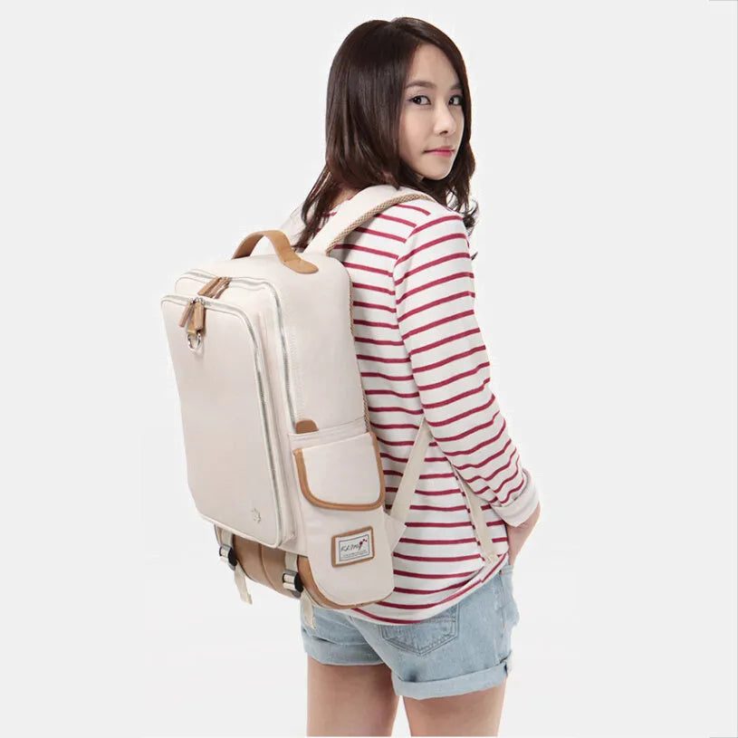 Modern men's Oxford cloth backpack in multiple colours showing large capacity design.