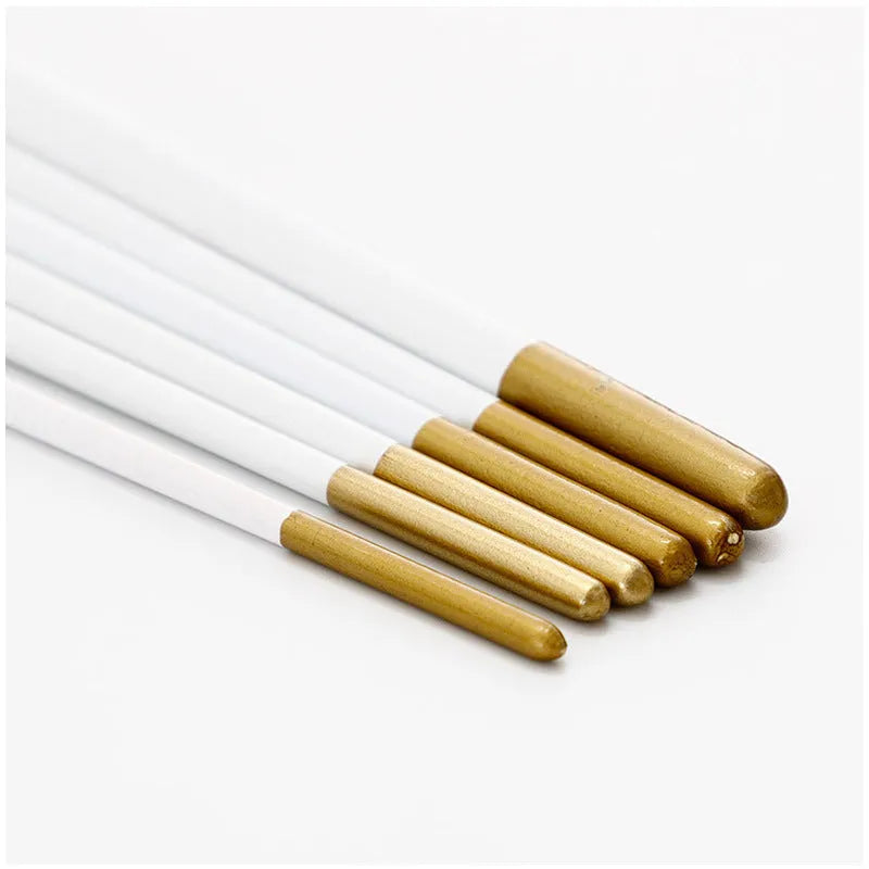 Set of six acrylic and watercolour paintbrushes with wooden handles on a white surface.