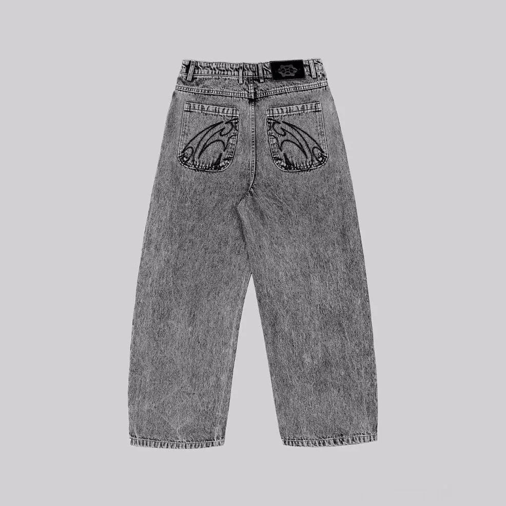 Grey loose fit straight-leg denim trousers for men and women on a mid-waist
