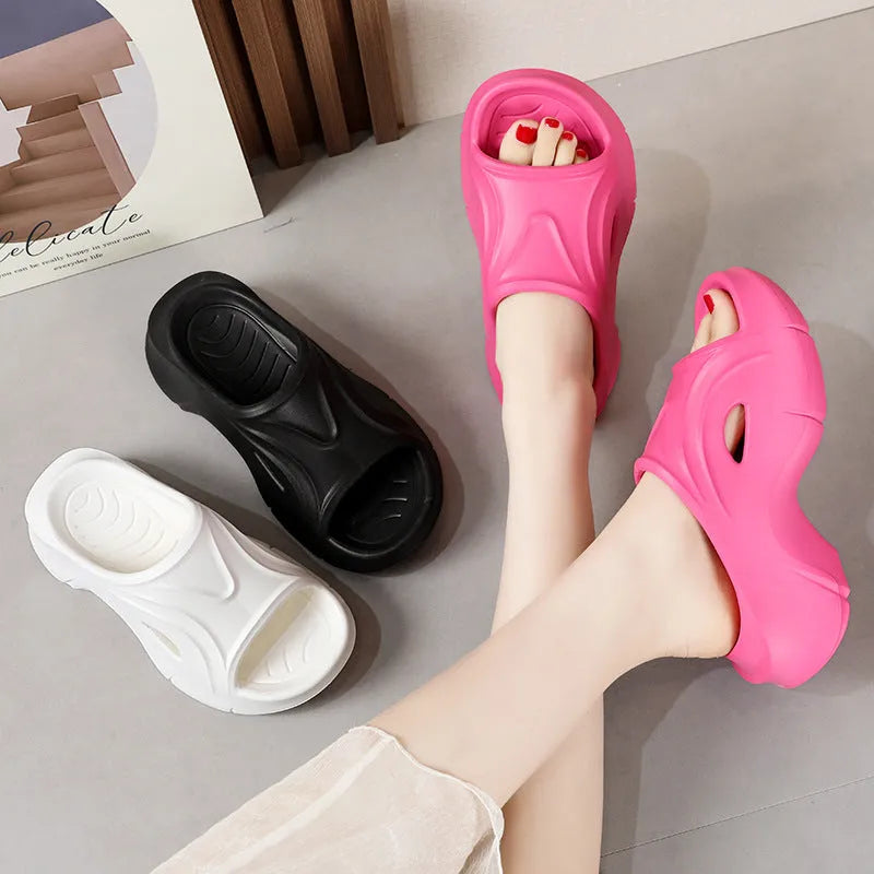 Women's white thick-soled EVA slippers with round toe design for beach use