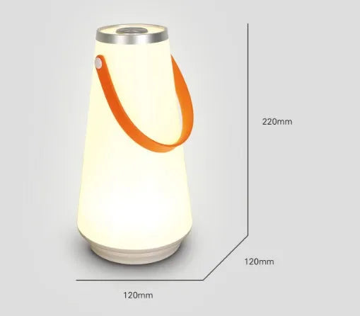 White rechargeable LED bedside lamp with square base measuring 12cm, showing warm white illumination from six LED beads