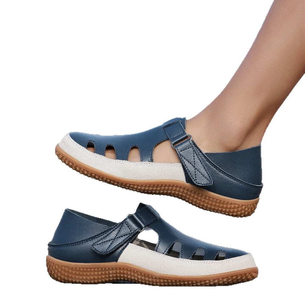 Women's white plus size flat heel sandals with hollow toe cap design and thick rubber sole