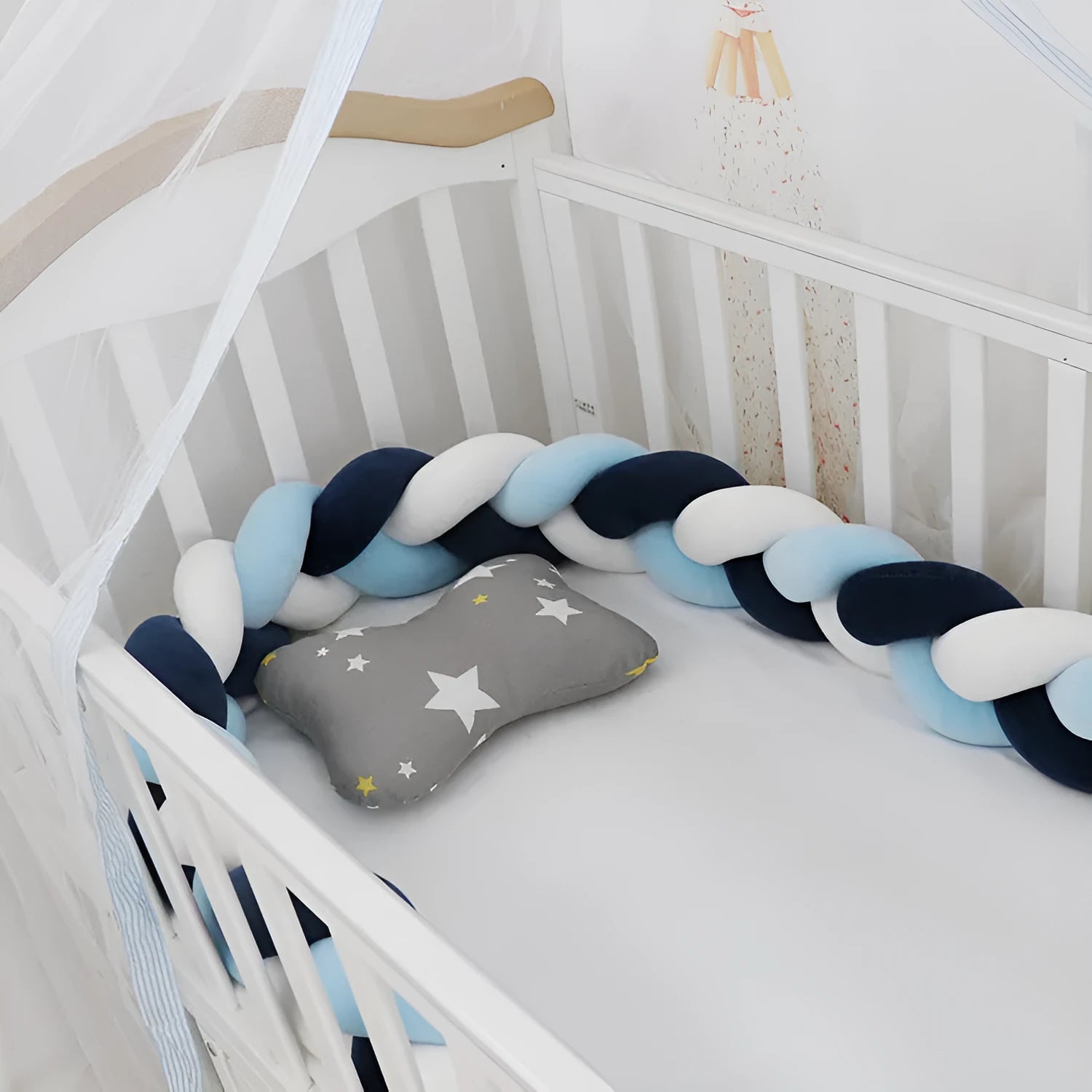 Braided knot design baby crib bumper in spandex velvet, shown in a light grey colour.