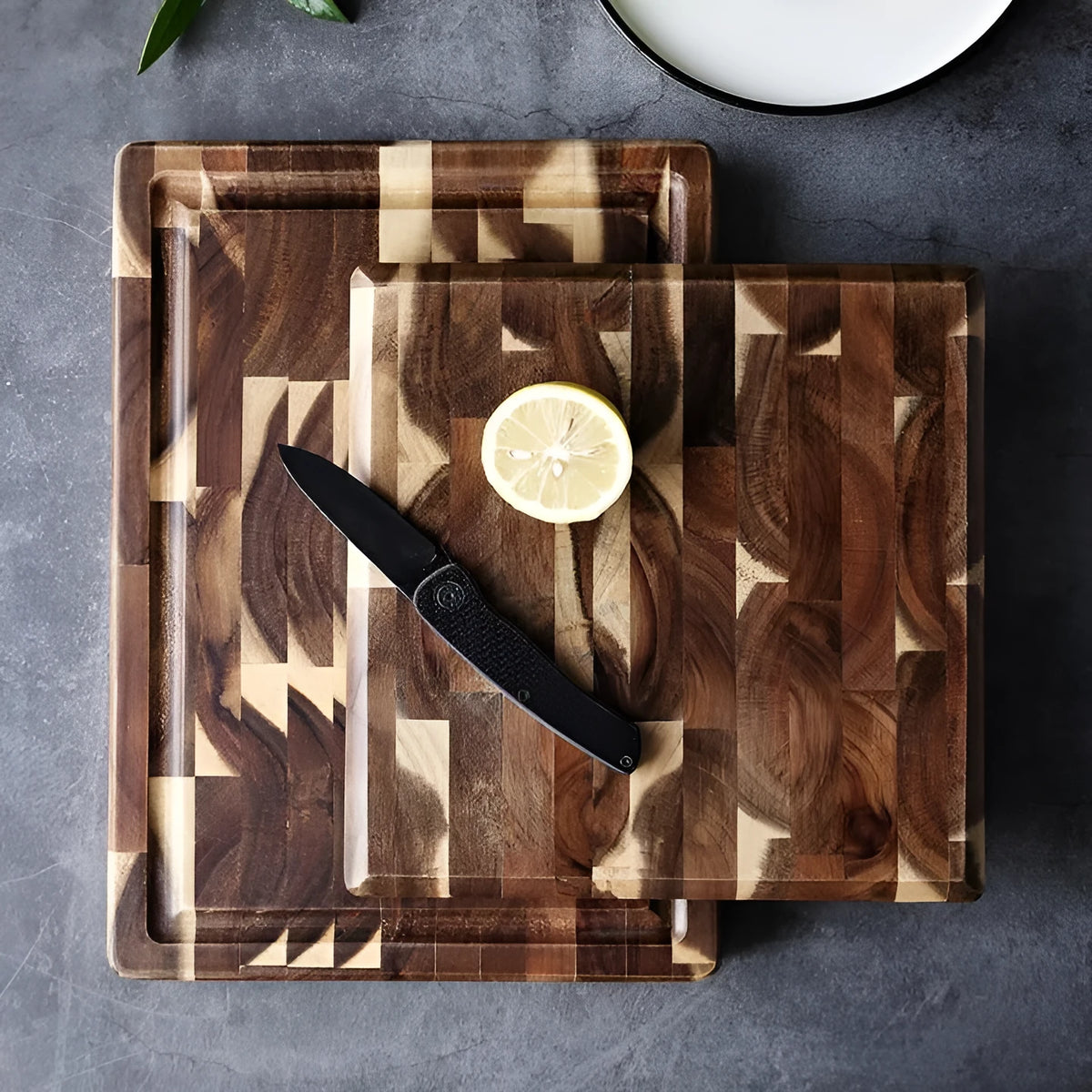 Brown solid acacia wood chopping board, 3cm thick, on a kitchen countertop.