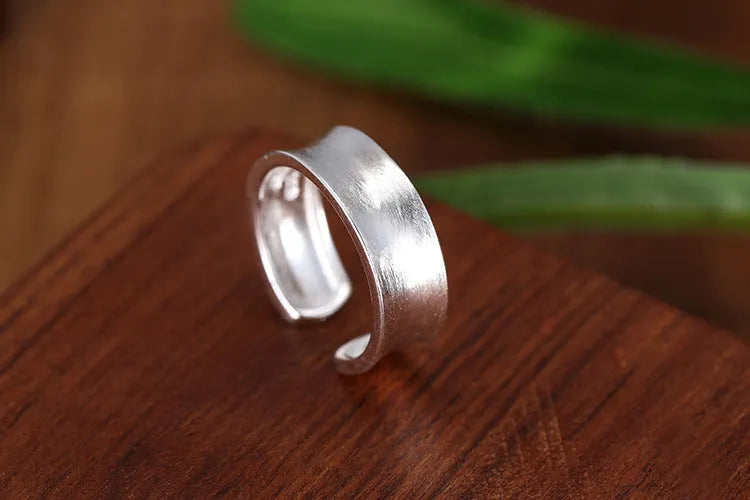 Open ring sterling silver with frosted finish and adjustable opening, geometry ornament