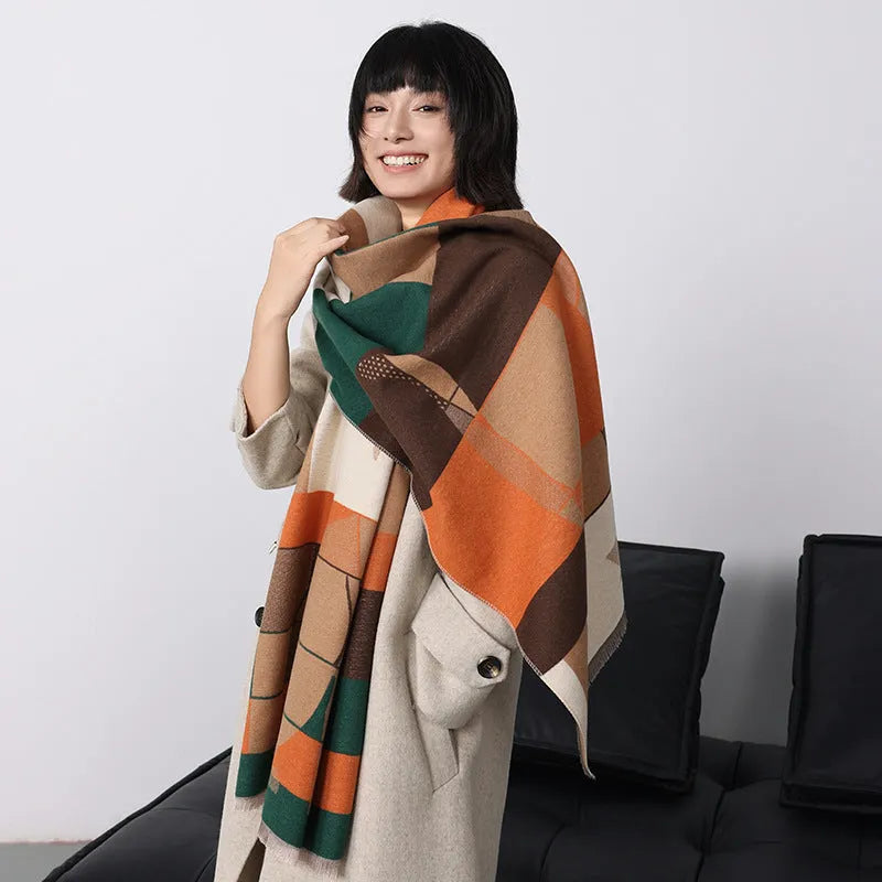 A long beige imitation cashmere scarf draped to show its 185cm length and texture.