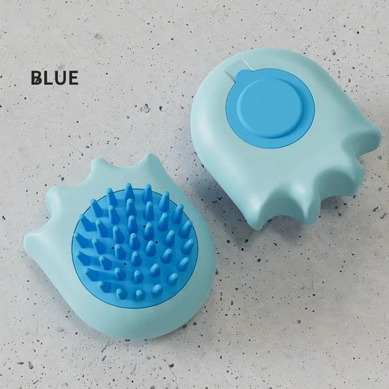 Blue pet bath brush with integrated shampoo box for washing cats and dogs.