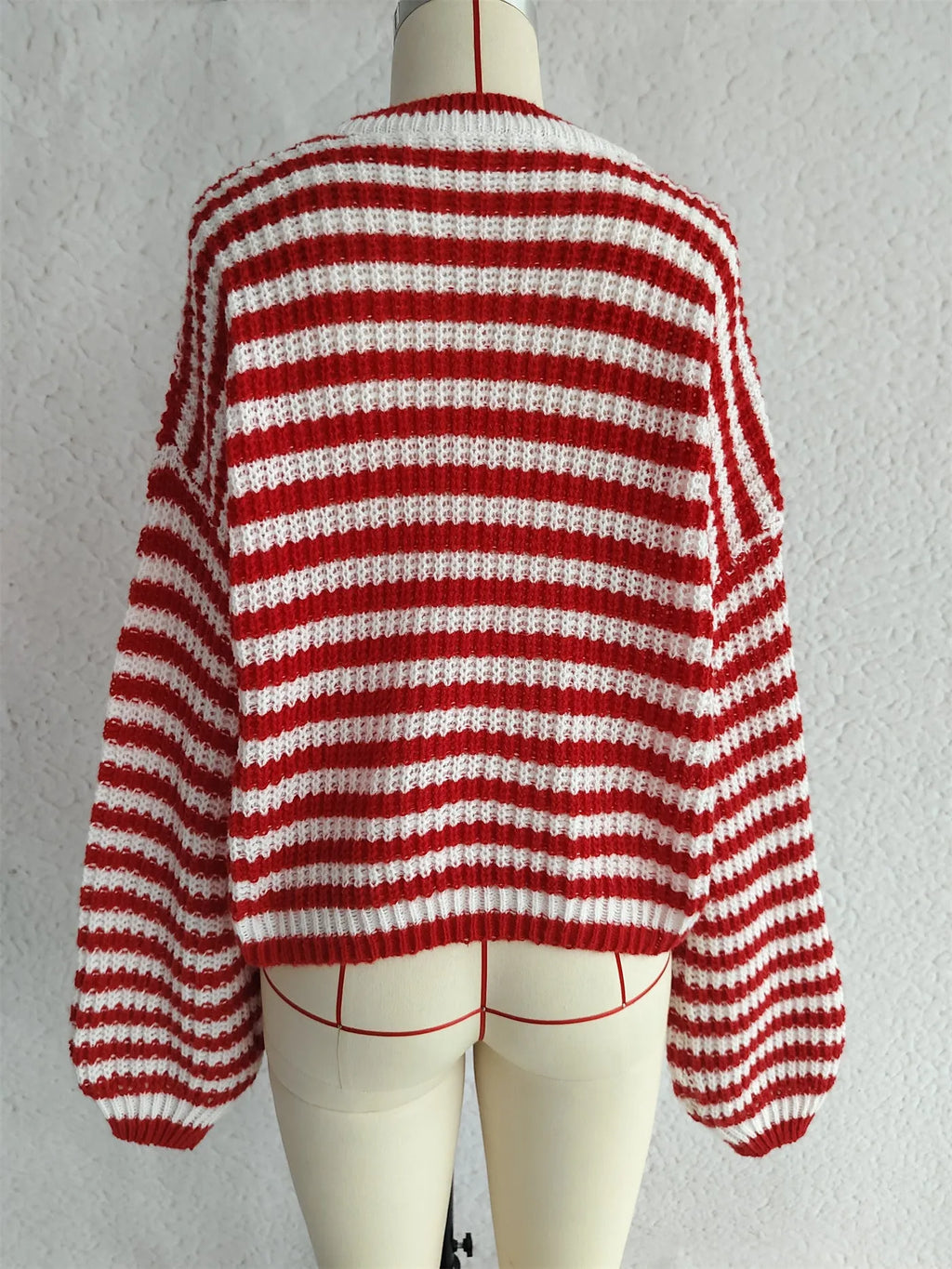 Women's vintage stripe knitted top with round neck and long loose sleeves in polyester fabric