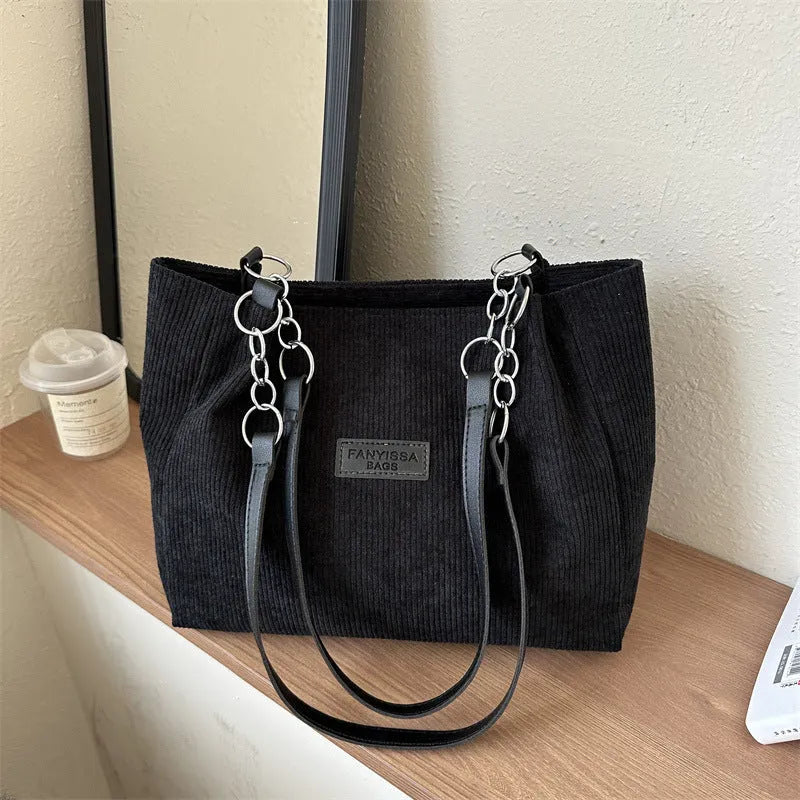 Corduroy one-shoulder tote handbag with three-dimensional pocket in street trend style