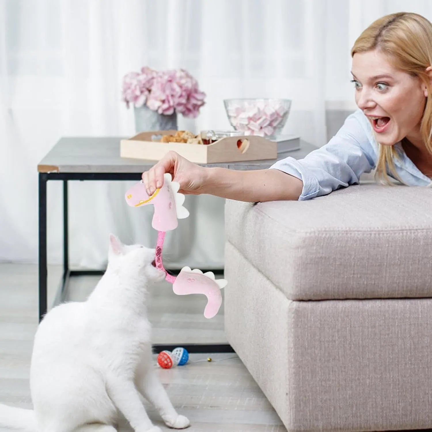 Bundle of four cat toys including rope, springs and kicker toy in pink, purple or yellow