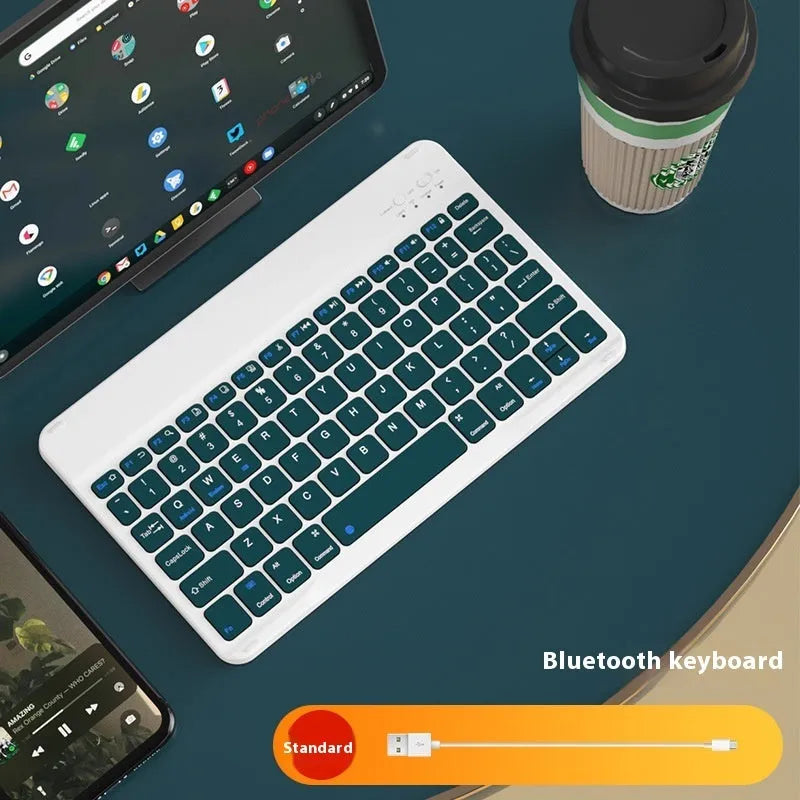 Girls Bluetooth tablet keyboard in multiple colour options including white, green, and pink on a desk
